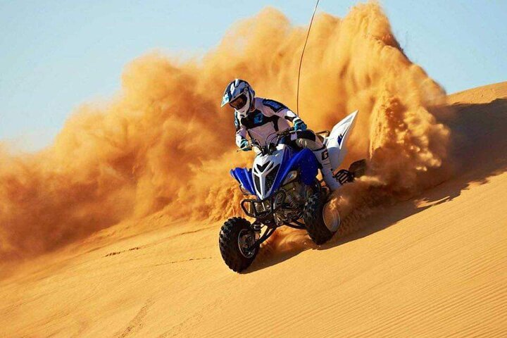 Experience the excitement of dune bashing in the Dubai Desert where adrenaline meets the stunning backdrop of golden sands and endless horizons promising unforgettable moments under the sun.